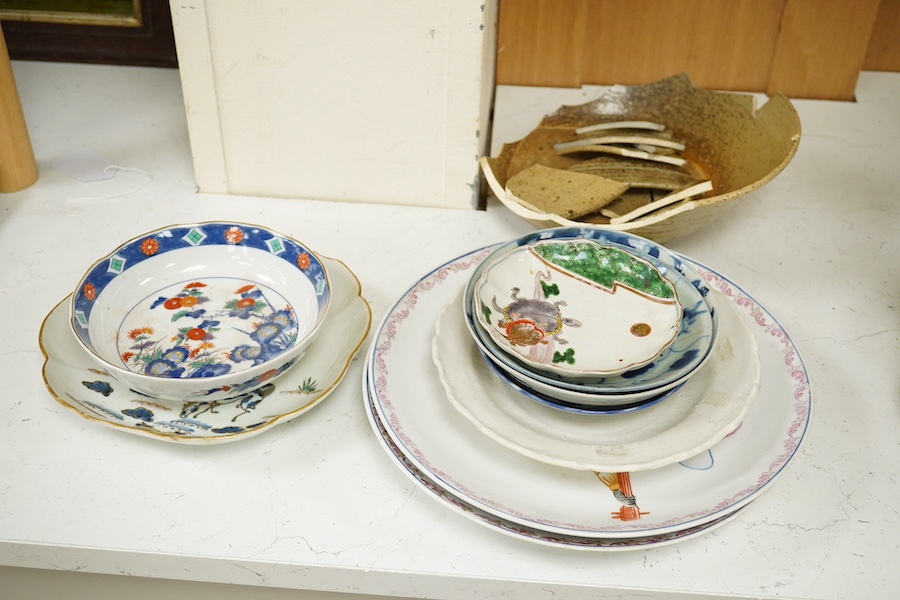 A quantity of various Chinese and Japanese dishes and plates, 18th century and later, largest plates 26cm diameter. Condition - varies